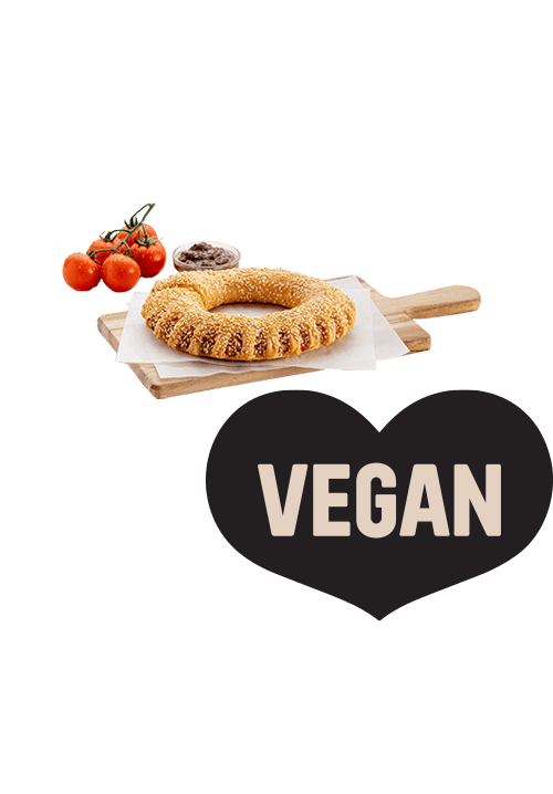 Traditional bagel with tomato and olive