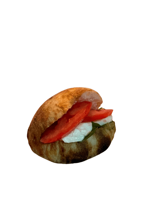 Mini σάντουιτς με μοτσαρέλα, ντομάτα, ρόκα και πέστο βασιλικού