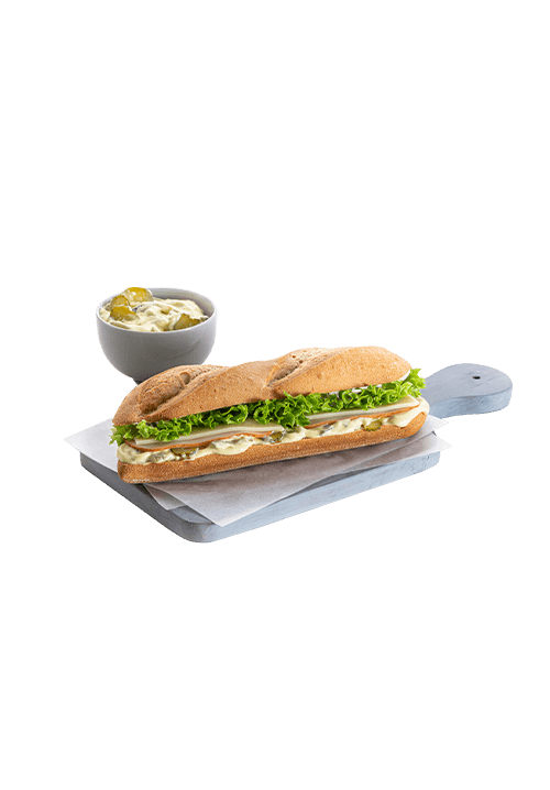 White baguette with turkey, edam and white sauce with pickled cucumber