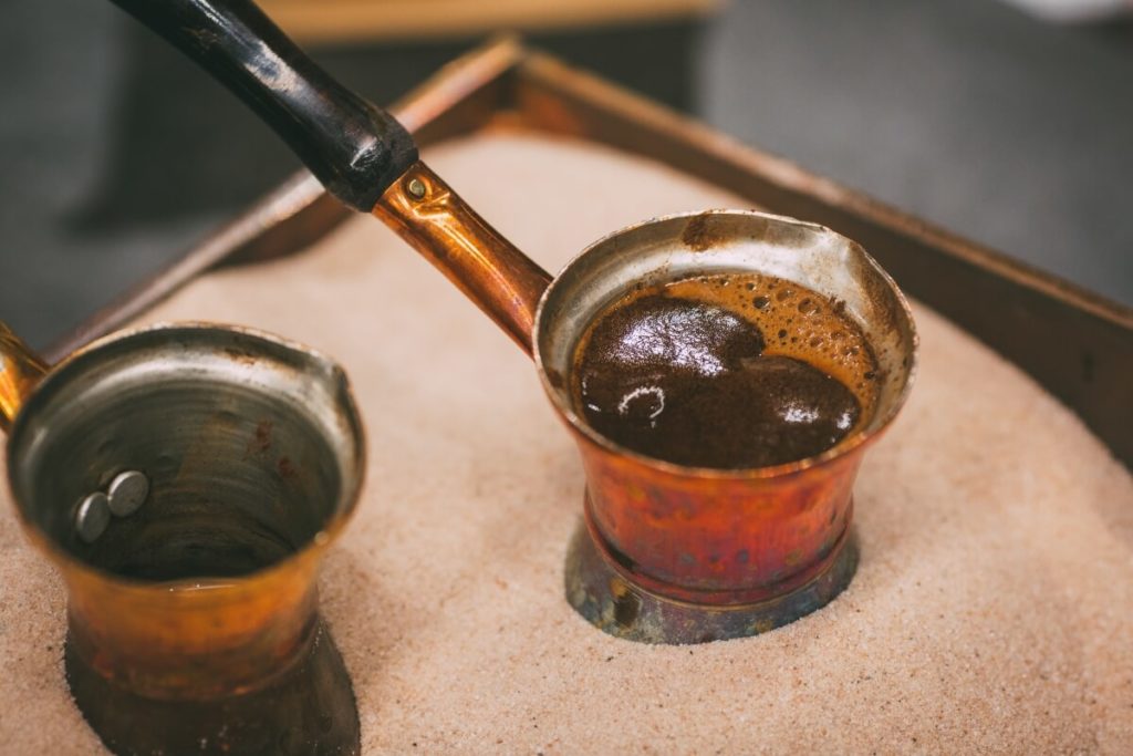 greek coffee getting prepared in ember