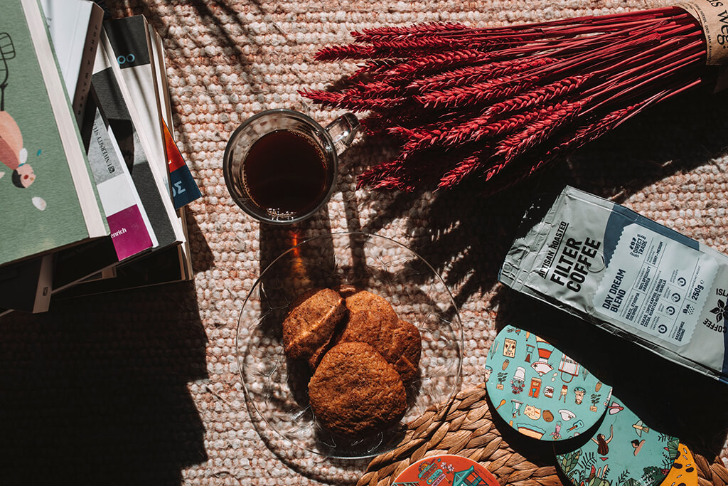 A homemade Coffee Island filter coffee with cookies.