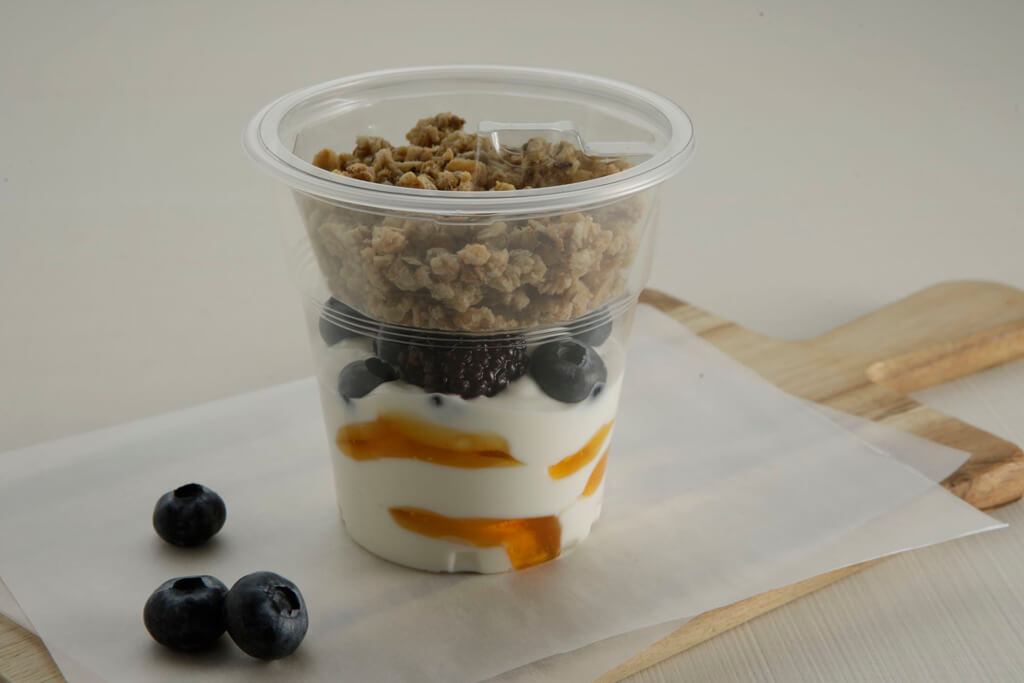 COFFEE ISLAND'S STRAINED YOGURT WITH HONEY GRANOLA AND FOREST FRUITS.