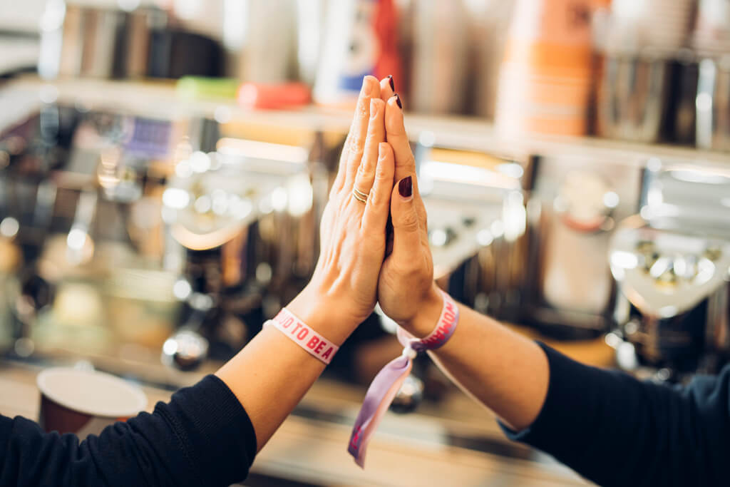 Barista hands touching