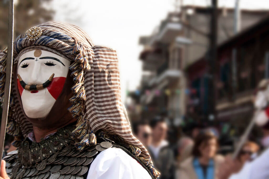 A man dressed up for carnival.