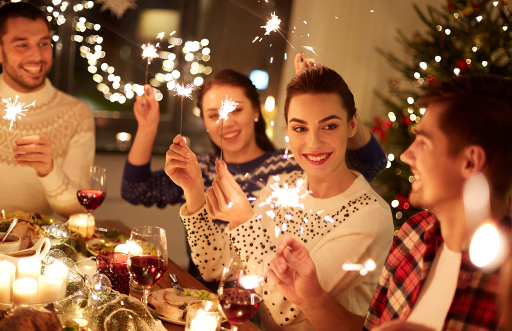 Friends smiling in christmas table