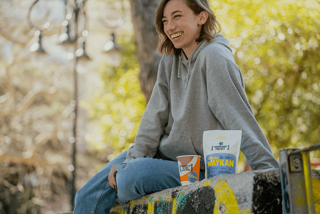 girl enjoys a cup of coffee